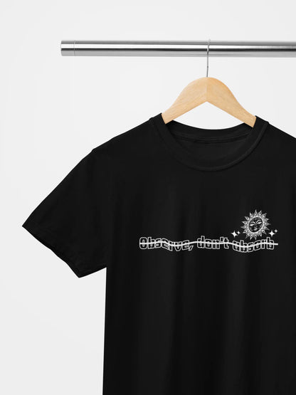 Black typography graphic t-shirt with Observe Don’t Absorb