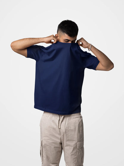 Model wearing classic blue regular fit cotton tee